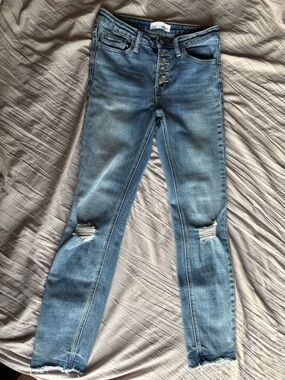 High-Rise Distressed Skinny Jeans in Faded Blue